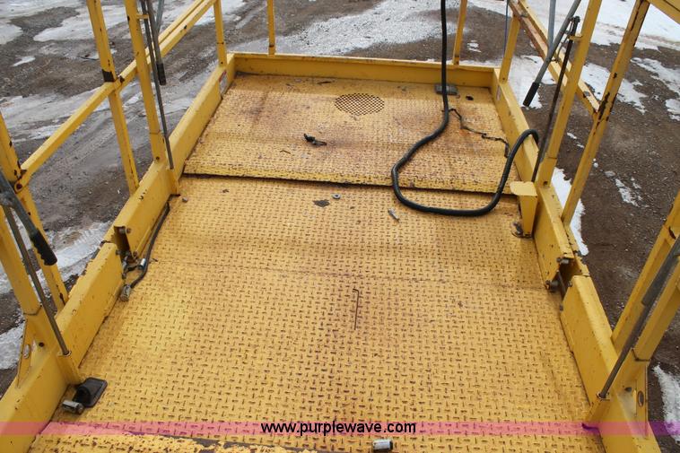 image for item C3641 2002 Haulotte HS4388RT scissor lift