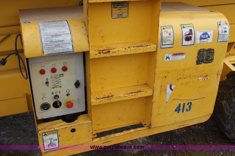 image for item C3641 2002 Haulotte HS4388RT scissor lift