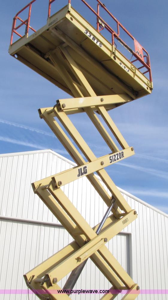 image for item E4639 2000 JLG 33RTS scissor lift