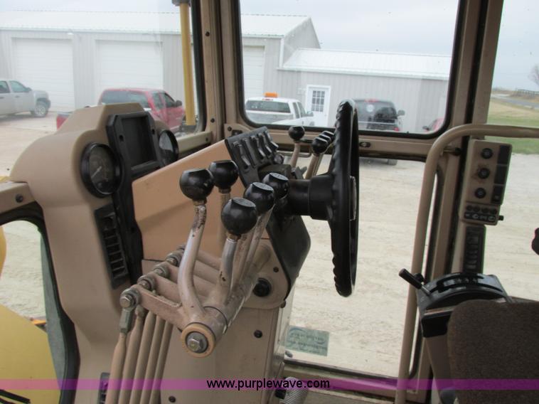 image for item F5459 1995 Caterpillar 120H articulated motor grader