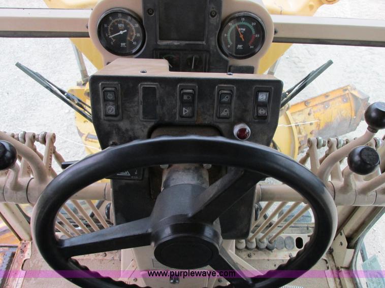 image for item F5459 1995 Caterpillar 120H articulated motor grader