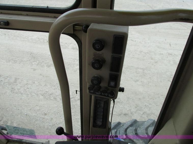 image for item F5459 1995 Caterpillar 120H articulated motor grader