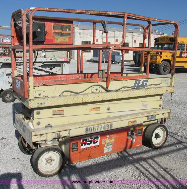 image for item F5469 1997 JLG 2033E electric scissor lift