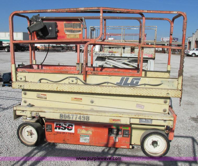 image for item F5469 1997 JLG 2033E electric scissor lift