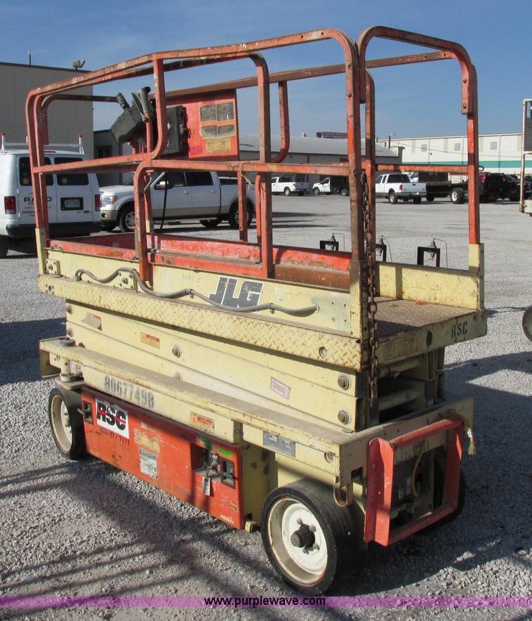 image for item F5469 1997 JLG 2033E electric scissor lift