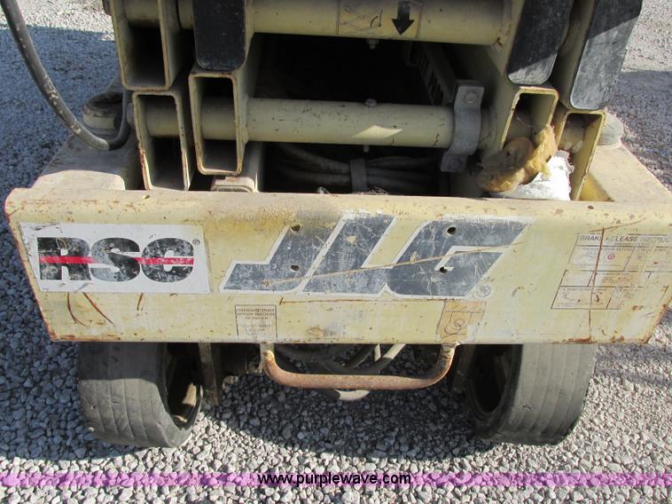 image for item F5469 1997 JLG 2033E electric scissor lift