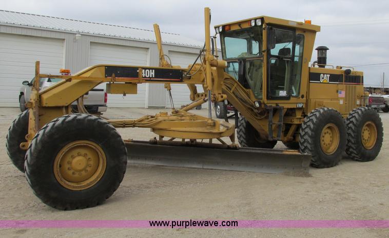 image for item F5472 1999 Caterpillar 140H articulated motor grader