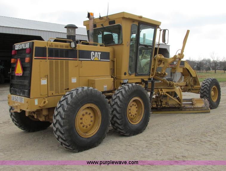 image for item F5472 1999 Caterpillar 140H articulated motor grader