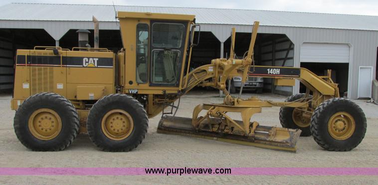 image for item F5472 1999 Caterpillar 140H articulated motor grader