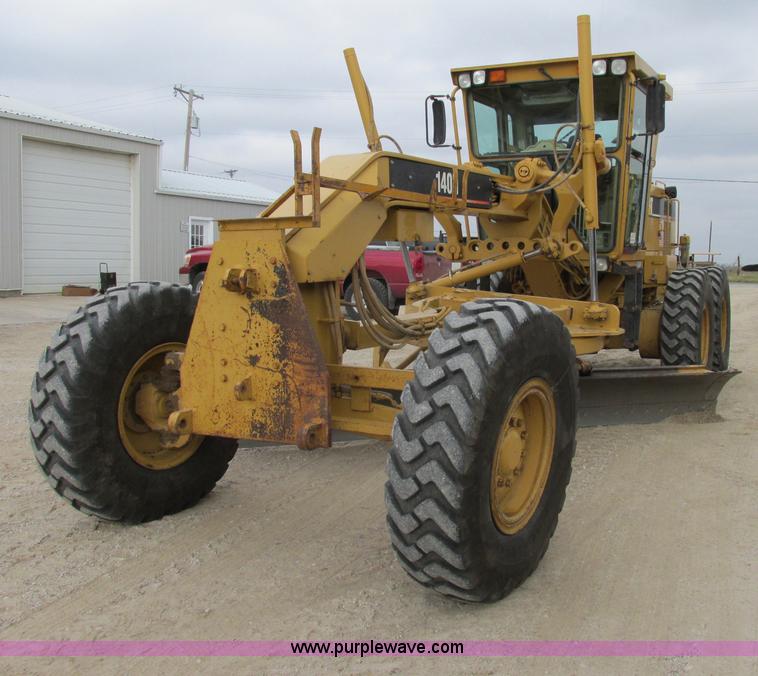 image for item F5472 1999 Caterpillar 140H articulated motor grader