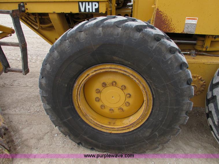 image for item F5472 1999 Caterpillar 140H articulated motor grader