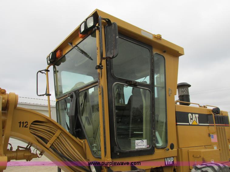 image for item F5472 1999 Caterpillar 140H articulated motor grader