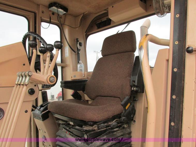 image for item F5472 1999 Caterpillar 140H articulated motor grader