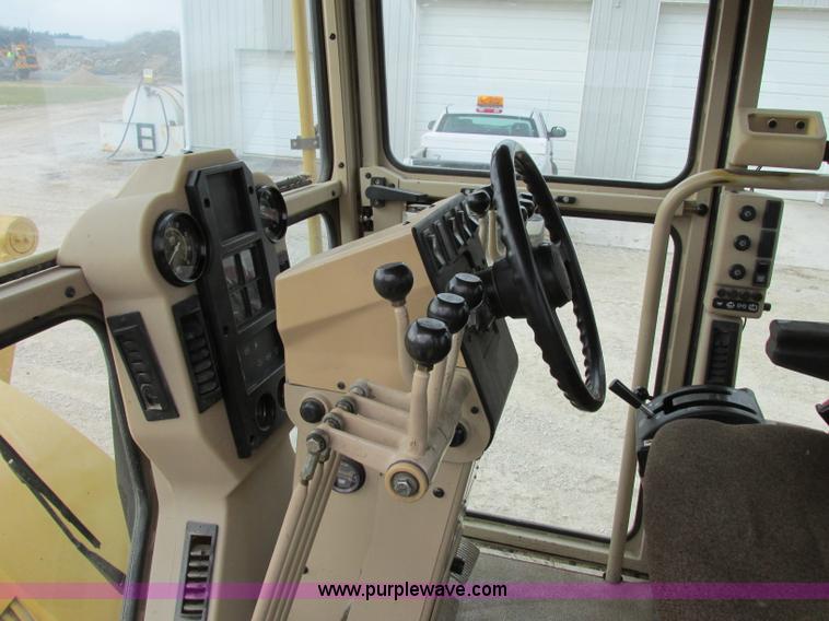 image for item F5472 1999 Caterpillar 140H articulated motor grader