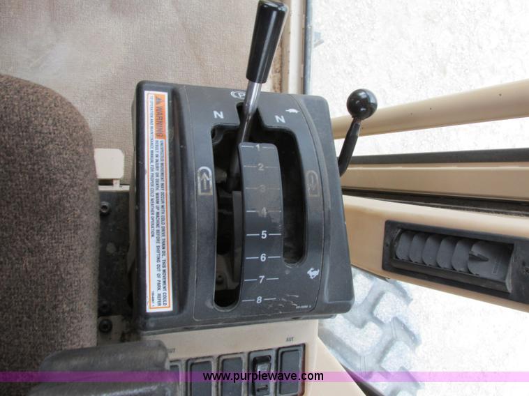 image for item F5472 1999 Caterpillar 140H articulated motor grader