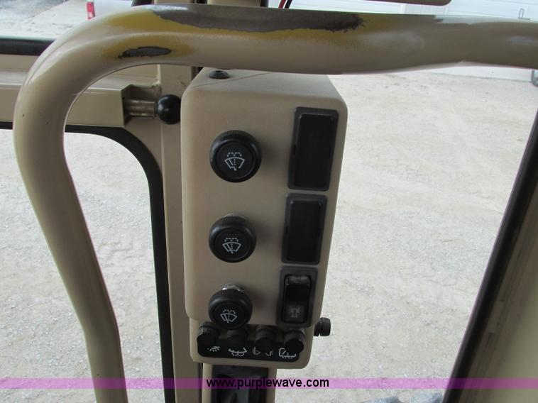 image for item F5472 1999 Caterpillar 140H articulated motor grader