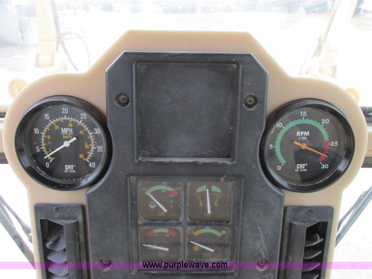 image for item F5472 1999 Caterpillar 140H articulated motor grader