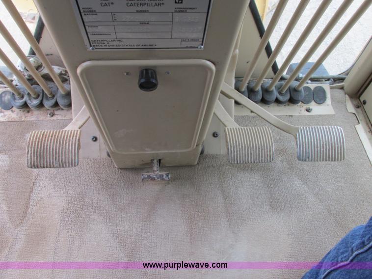 image for item F5472 1999 Caterpillar 140H articulated motor grader