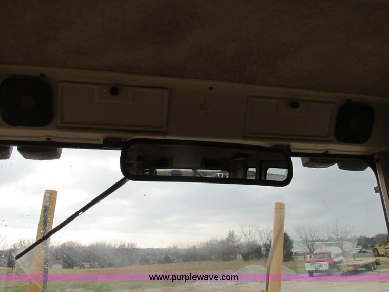 image for item F5472 1999 Caterpillar 140H articulated motor grader