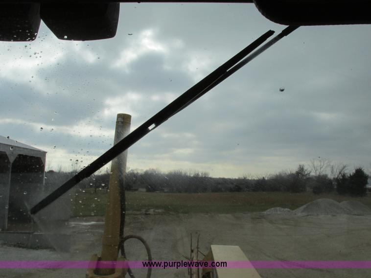 image for item F5472 1999 Caterpillar 140H articulated motor grader