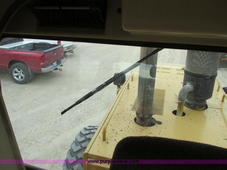 image for item F5472 1999 Caterpillar 140H articulated motor grader