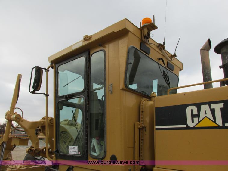 image for item F5472 1999 Caterpillar 140H articulated motor grader