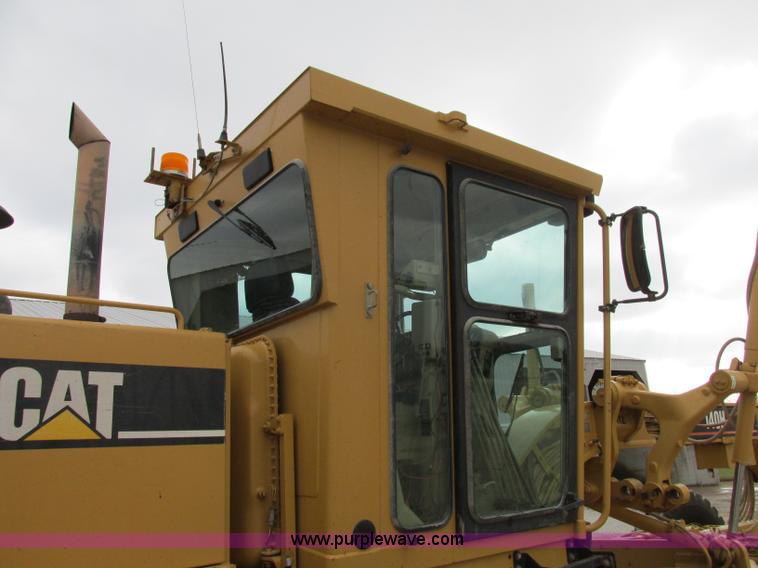 image for item F5472 1999 Caterpillar 140H articulated motor grader