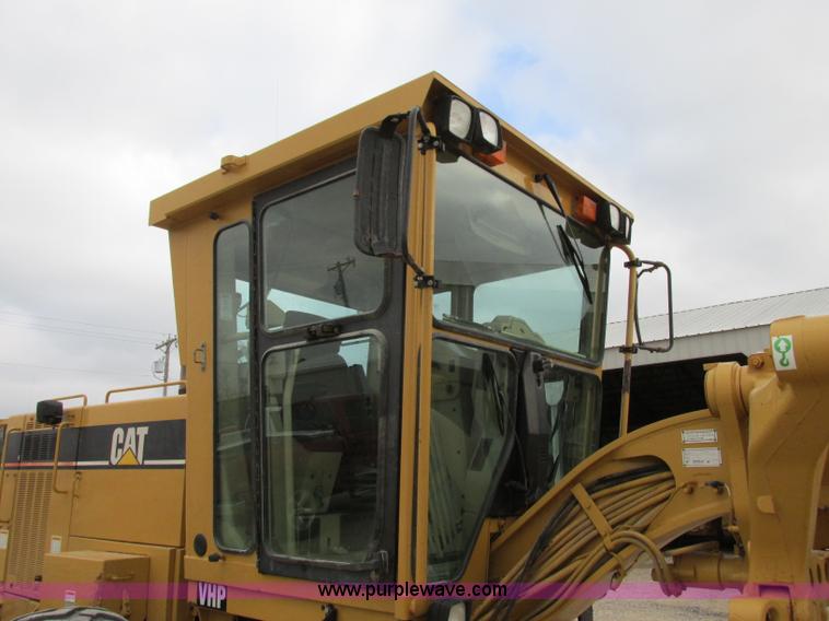 image for item F5472 1999 Caterpillar 140H articulated motor grader