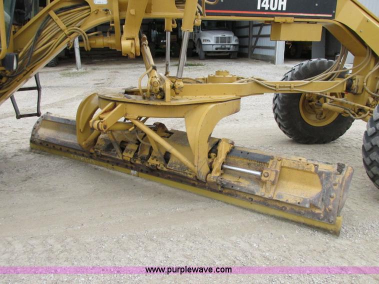 image for item F5472 1999 Caterpillar 140H articulated motor grader