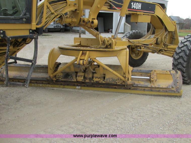 image for item F5472 1999 Caterpillar 140H articulated motor grader