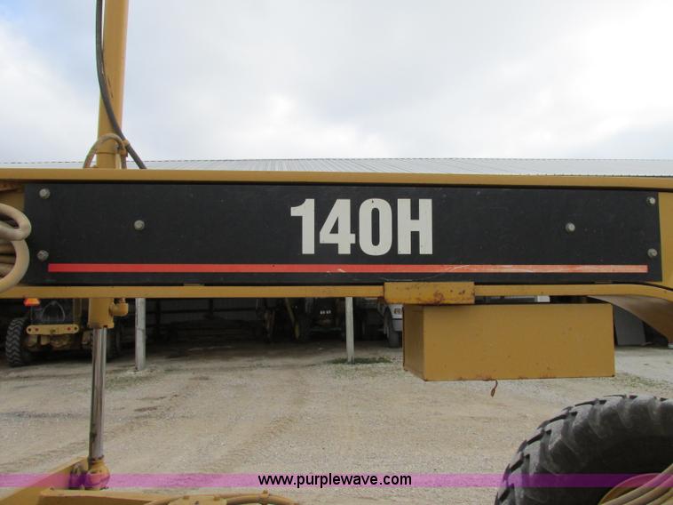 image for item F5472 1999 Caterpillar 140H articulated motor grader