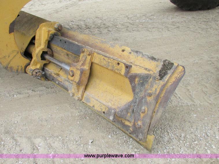 image for item F5472 1999 Caterpillar 140H articulated motor grader