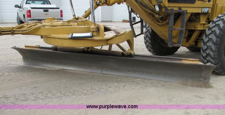 image for item F5472 1999 Caterpillar 140H articulated motor grader