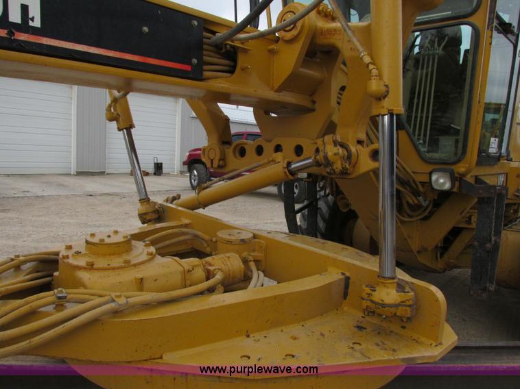 image for item F5472 1999 Caterpillar 140H articulated motor grader