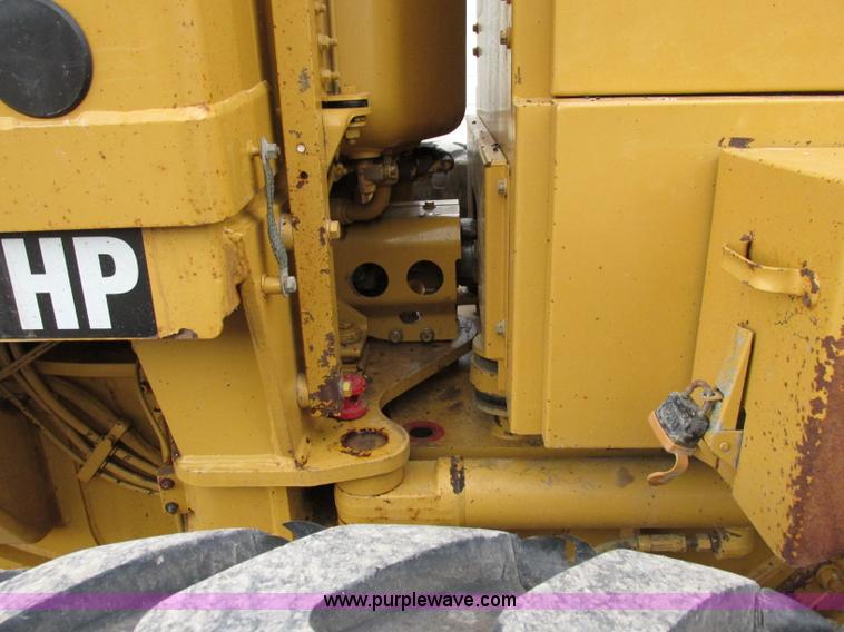 image for item F5472 1999 Caterpillar 140H articulated motor grader
