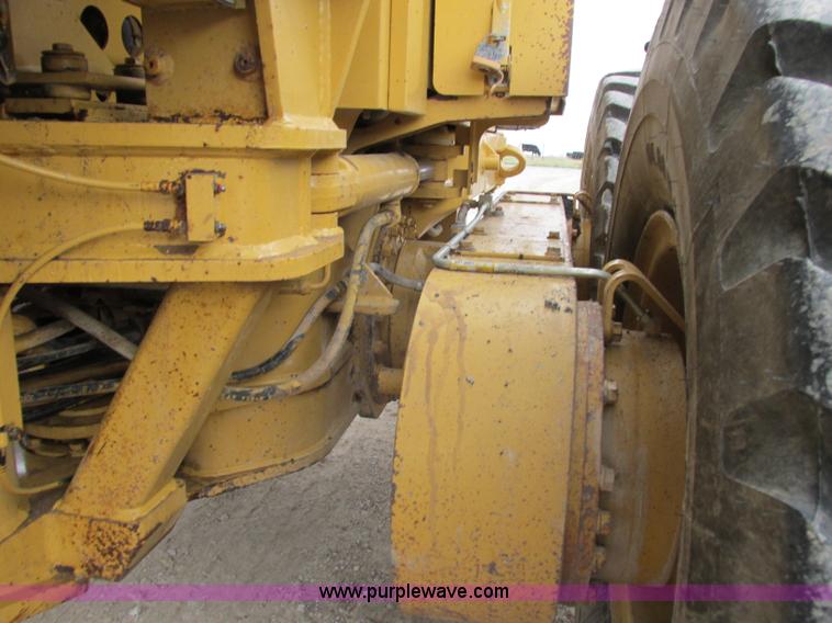 image for item F5472 1999 Caterpillar 140H articulated motor grader