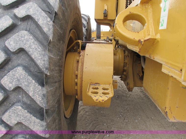 image for item F5472 1999 Caterpillar 140H articulated motor grader