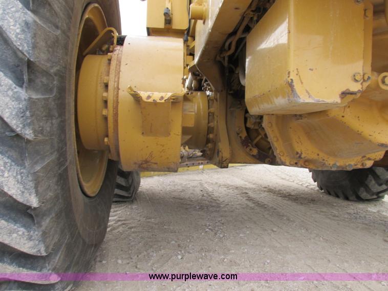 image for item F5472 1999 Caterpillar 140H articulated motor grader