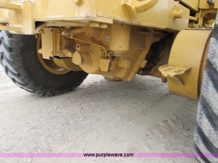 image for item F5472 1999 Caterpillar 140H articulated motor grader