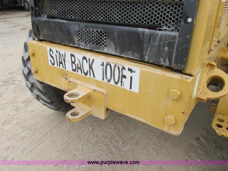 image for item F5472 1999 Caterpillar 140H articulated motor grader