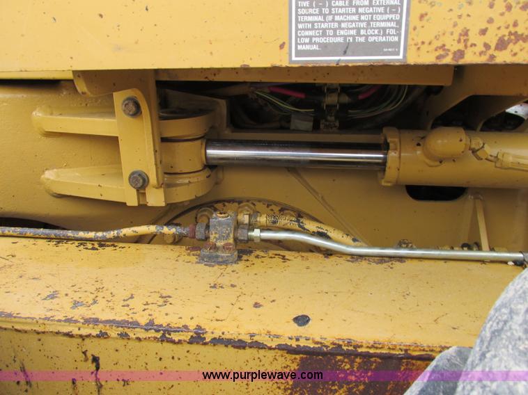 image for item F5472 1999 Caterpillar 140H articulated motor grader