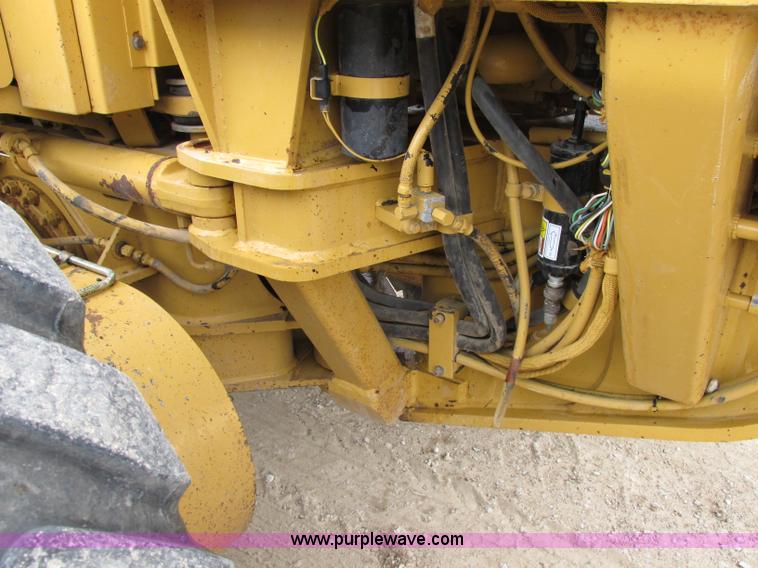 image for item F5472 1999 Caterpillar 140H articulated motor grader