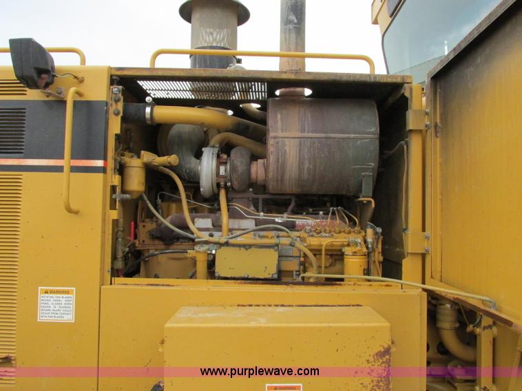 image for item F5472 1999 Caterpillar 140H articulated motor grader