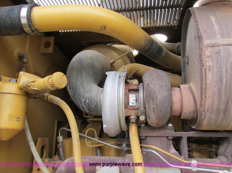 image for item F5472 1999 Caterpillar 140H articulated motor grader