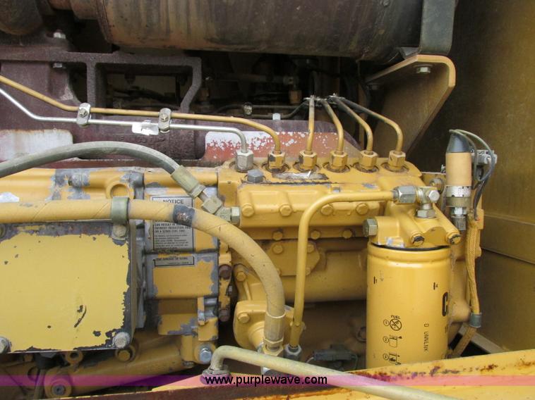 image for item F5472 1999 Caterpillar 140H articulated motor grader