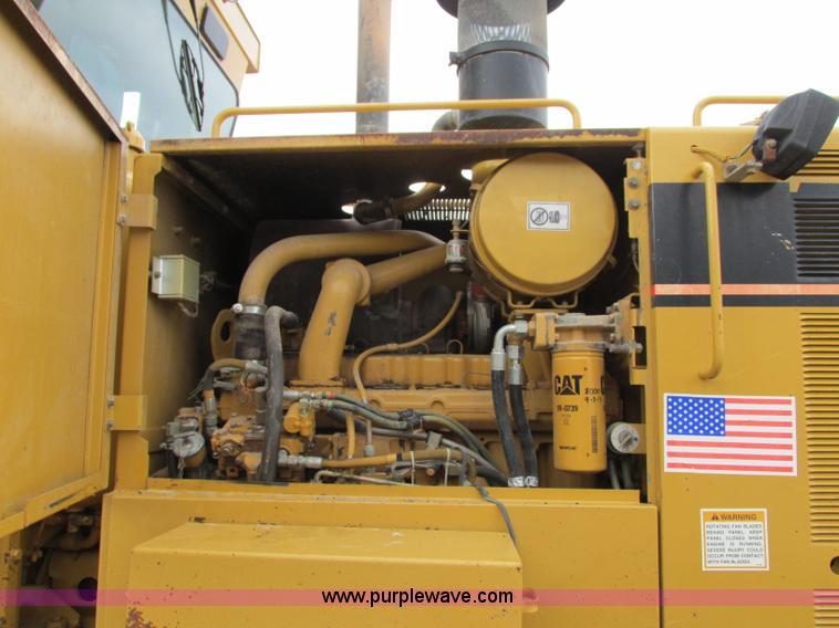 image for item F5472 1999 Caterpillar 140H articulated motor grader