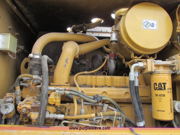 image for item F5472 1999 Caterpillar 140H articulated motor grader