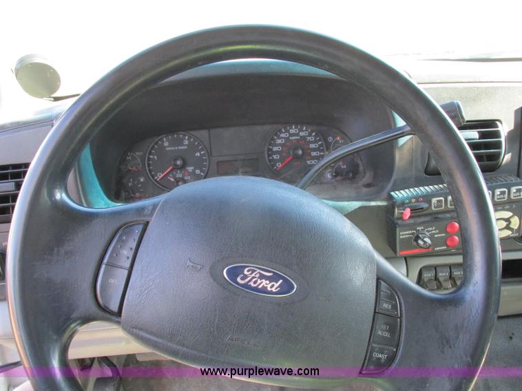 image for item F5480 2006 Ford F350 Super Duty XL SuperCab flatbed pickup truck