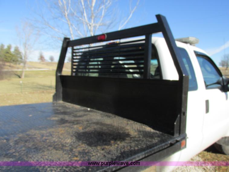 image for item F5480 2006 Ford F350 Super Duty XL SuperCab flatbed pickup truck