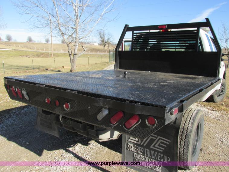 image for item F5480 2006 Ford F350 Super Duty XL SuperCab flatbed pickup truck